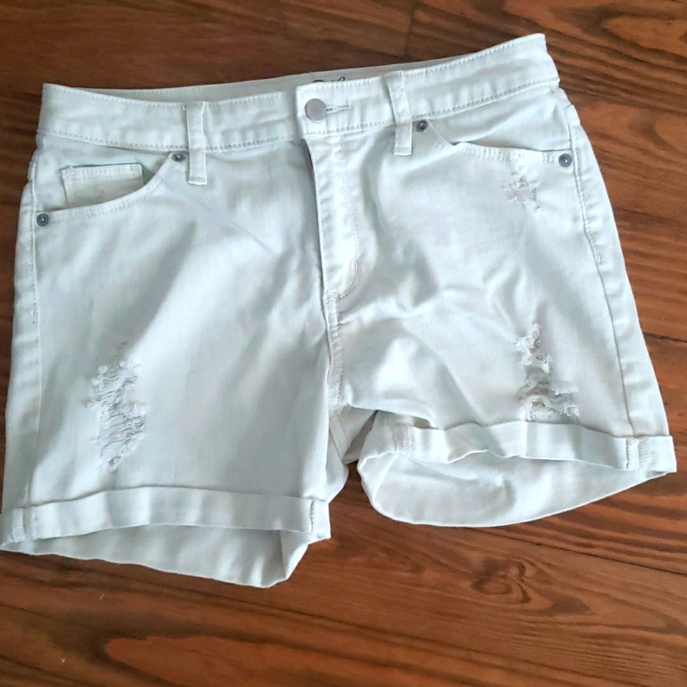 White distressed shorts